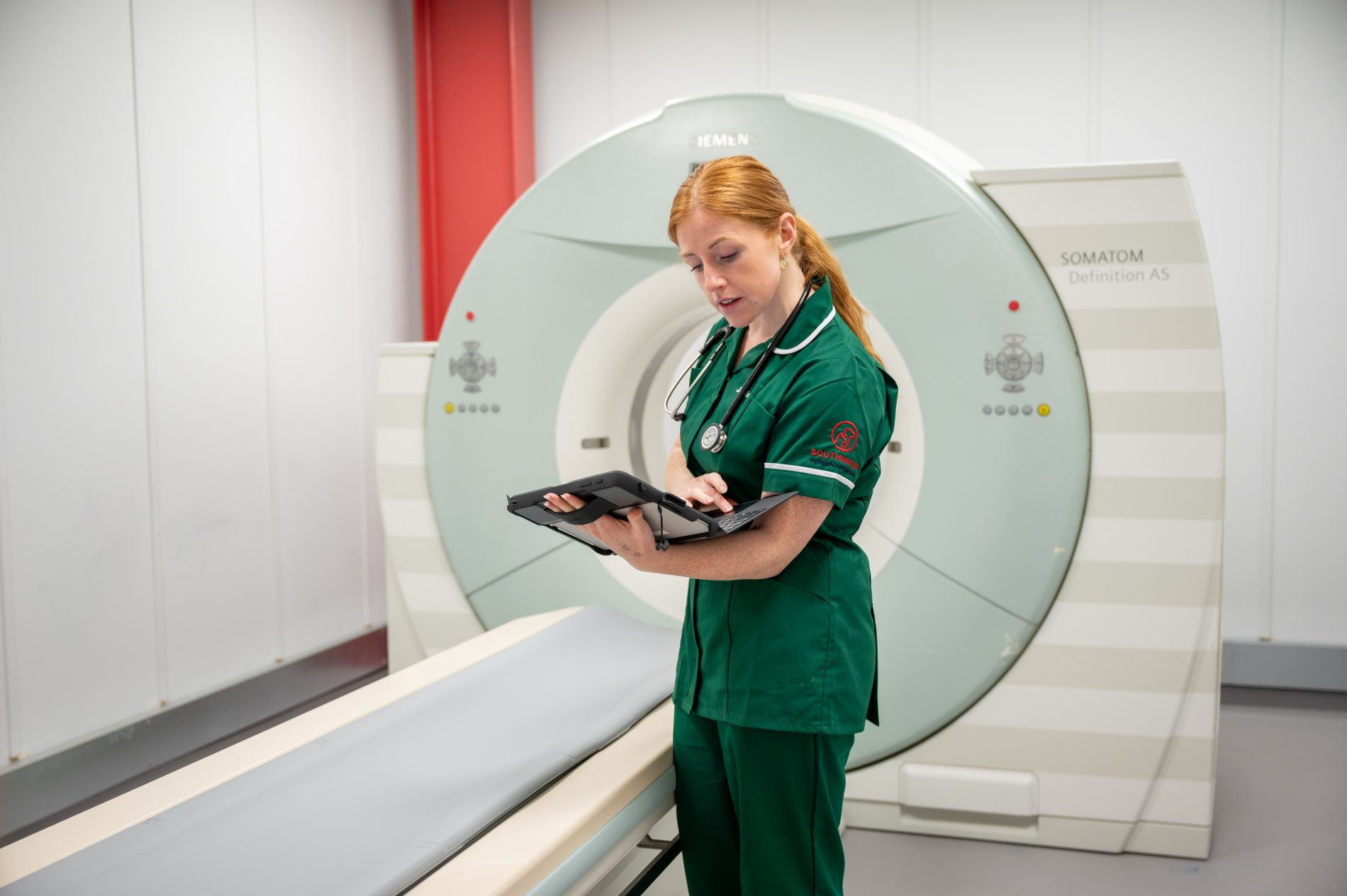 A vet operating a CT scanner at Southwater Vets in Telford